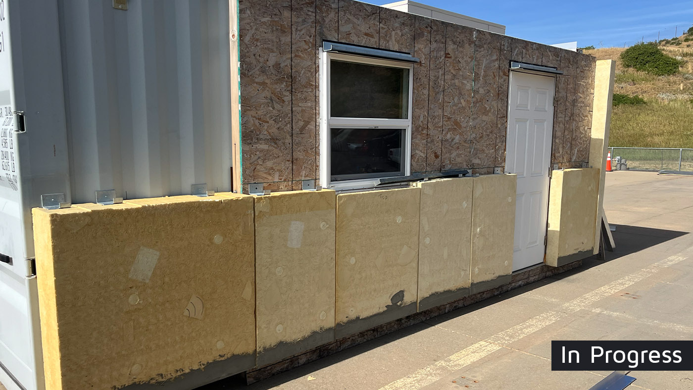 BranchRegenerate panels being installed over the existing wall